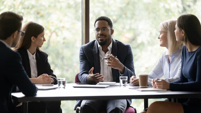 Business professionals collaborating in a meeting